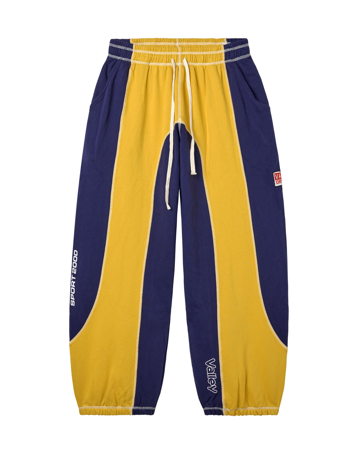 Yellow and navy track pants with a brand logo on the sides of both pant legs. 