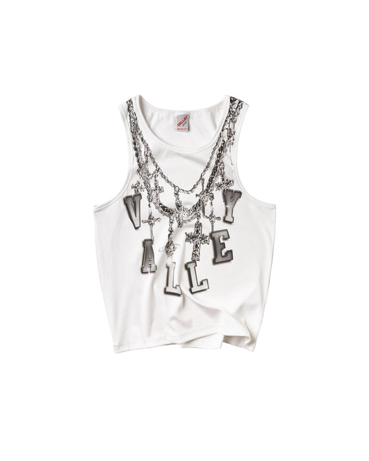 A white sleeveless tank top featuring a graphic of layered silver chains and dangling letters spelling 'VALLEY' across the front.