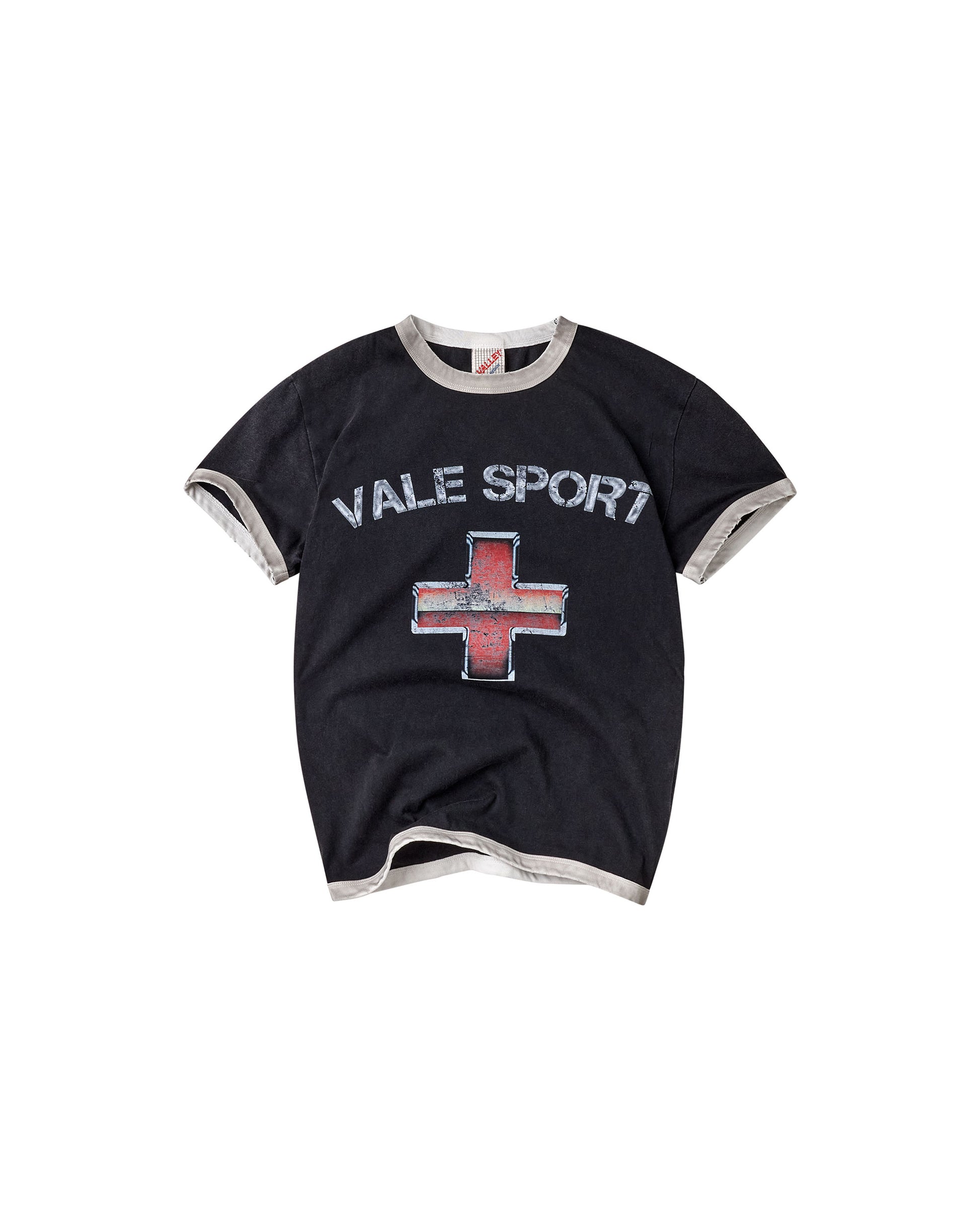 A black ringer t-shirt with gray ribbed trim on the collar, cuffs, and hem, featuring 'VALE SPORT' in white text and a red and gray cross graphic on the front.