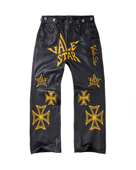 Black leather pants featuring yellow 'Vale Star' graphics with Iron Cross motifs.