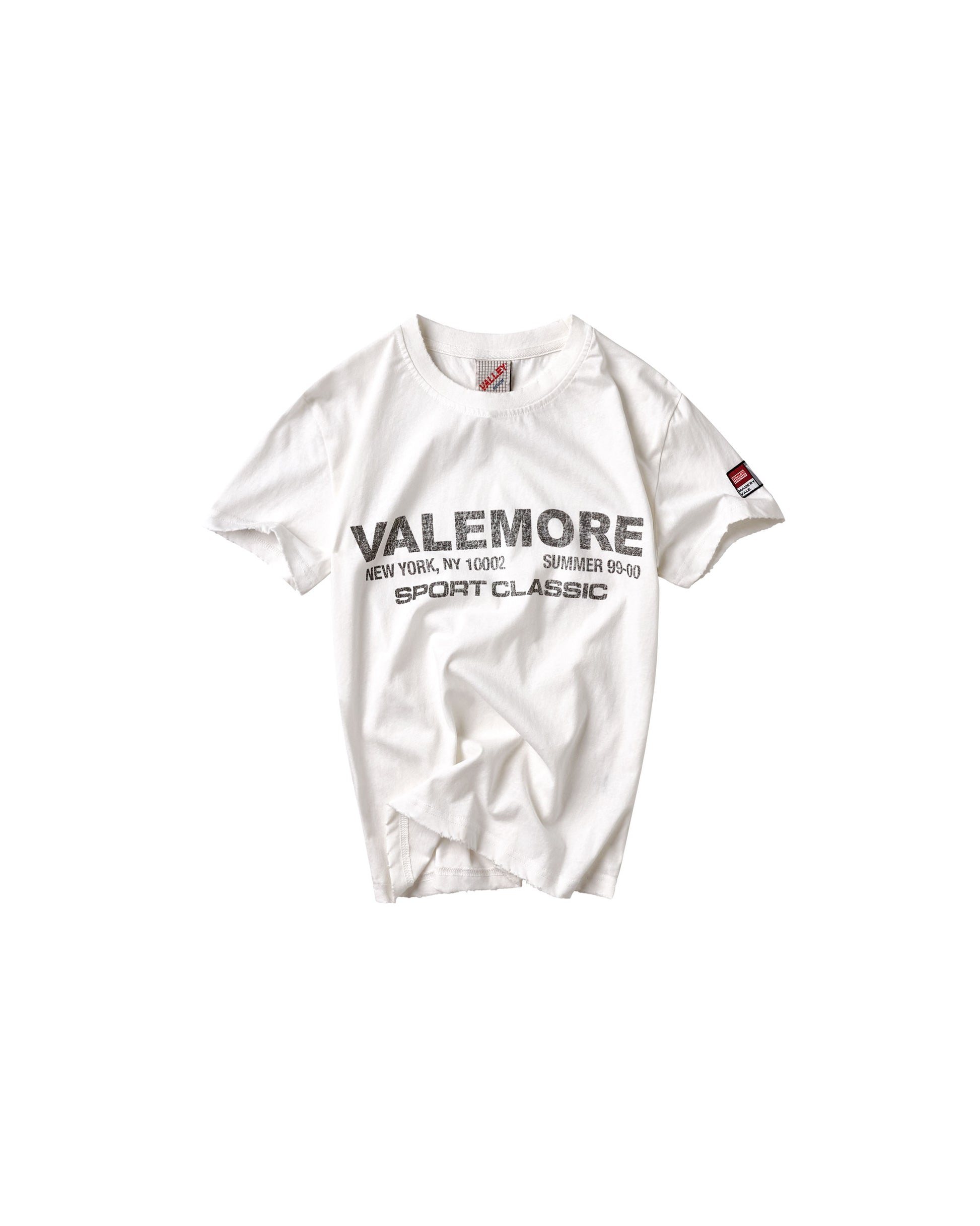 A white short-sleeve crewneck t-shirt with 'VALEMORE SPORT CLASSIC' printed in black across the chest, displayed flat against a solid white background.